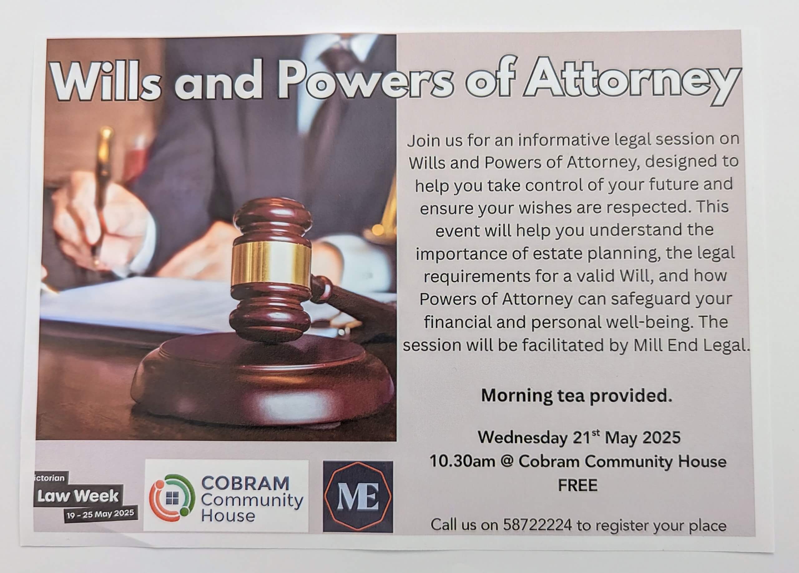 Image displaying a gavel and a person writing in the background.